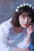花环少女海边白裙飘飘